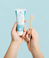 Tube of DR. Wild Emoform Sensitive Toothpaste with mineral salt formula and fluoride protection